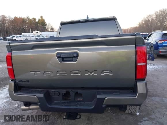 2024 Toyota Tacoma SR5 with VIN 3TMLB5JN9RM046175, listed as a IAAI auction lot 41006597 with 6,139 mi miles and . Bid and sale history available at DreamBid. Image 16.