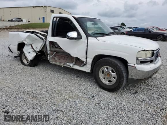 2002 GMC Sierra 1500 SLE with VIN 1GTEC14V22Z344470, listed as a Copart auction lot 74596054 with 165,810 mi miles and Salvage title. Bid and sale history available at DreamBid. Image 4.