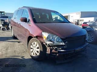 2007 Honda Odyssey Touring z VIN 5FNRL38857B066842, wystawiony jako IAAI lot #43371446 z przebiegiem 263 076 mil mil oraz . Historia ofert i sprzedaży dostępna na DreamBid. Obrazek 1.