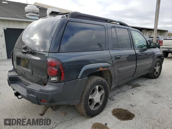 2004 Chevrolet TrailBlazer EXT LT с VIN 1GNET16S446112323, выставлен на аукционе Copart как лот 41409575 с пробегом 229 385 миль миль и На запчасти • Non repairable. История ставок и продаж доступна на DreamBid. Изображение 3.