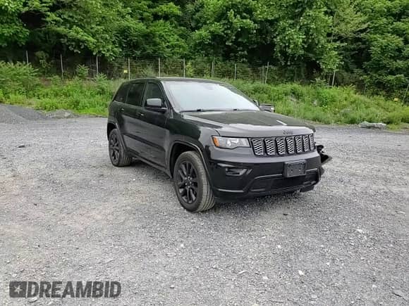2019 Jeep Grand Cherokee Laredo E with VIN 1C4RJFAG3KC629143, listed as a Copart auction lot 61034645 with 98,539 mi miles and Salvage title. Bid and sale history available at DreamBid. Image 14.
