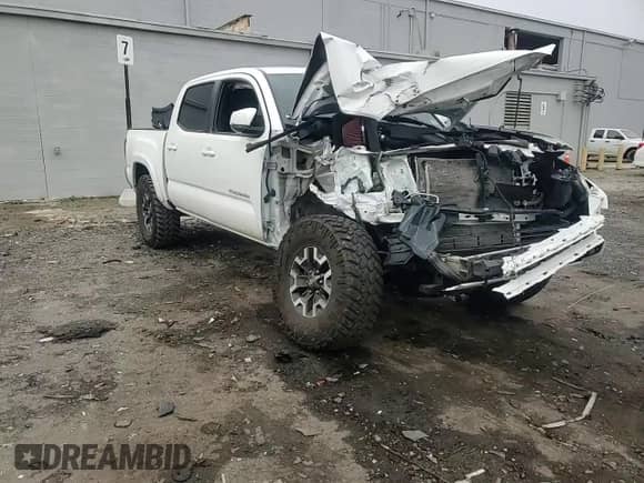 2018 Toyota Tacoma TRD Off Road with VIN 3TMCZ5ANXJM138363, listed as a Copart auction lot 84400805 with 95,418 mi miles and Salvage title. Bid and sale history available at DreamBid. Image 13.