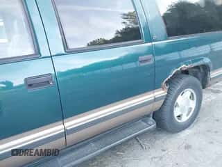 1996 Chevrolet Suburban with VIN 1GNFK16RXTJ350029, listed as a IAAI auction lot 43115889 with 184,260 mi miles and . Bid and sale history available at DreamBid. Image 6.