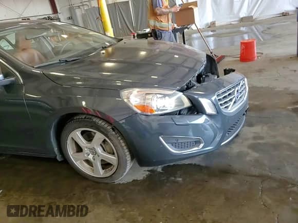 2013 Volvo S60 T5 с VIN YV1612FH0D2186420, выставлен на аукционе Copart как лот 80448915 с пробегом 119 615 миль миль и Списание • Salvage title. История ставок и продаж доступна на DreamBid. Изображение 13.