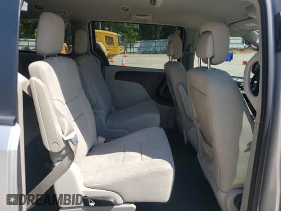 2012 Dodge Grand Caravan SE z VIN 2C4RDGBG2CR167940, wystawiony jako Copart lot #70567435 z przebiegiem 139 016 mil mil oraz Szkoda całkowita • Salvage title. Historia ofert i sprzedaży dostępna na DreamBid. Obrazek 11.