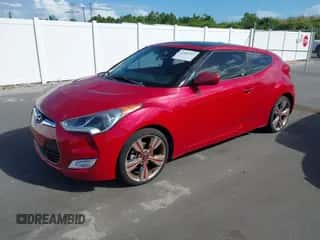 2013 Hyundai Veloster w/Gray Int with VIN KMHTC6AD5DU118466, listed as a IAAI auction lot 43383241 with 112,103 mi miles and . Bid and sale history available at DreamBid. Image 2.