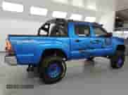 2005 Toyota Tacoma PreRunner with VIN 3TMJU62N05M002100, listed as a Copart auction lot 84837805 with 300,227 mi miles and Clean title. Bid and sale history available at DreamBid. Image 3.