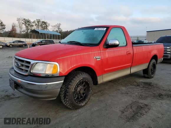 2001 Ford F-150 XL z VIN 2FTRF17W21CB04408, wystawiony jako Copart lot #79872124 z przebiegiem 82 773 mil mil oraz Szkoda całkowita • Salvage title. Historia ofert i sprzedaży dostępna na DreamBid. Obrazek 1.