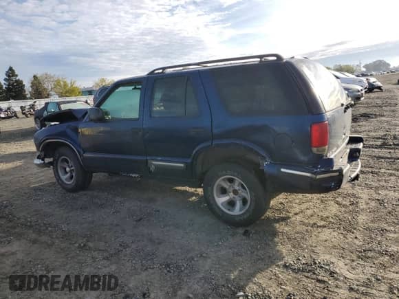 1998 Chevrolet Blazer LS with VIN 1GNCS13W5W2293895, listed as a Copart auction lot 49852655 with Not provided miles and Salvage title. Bid and sale history available at DreamBid. Image 2.