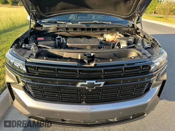 2021 Chevrolet Tahoe RST z VIN 1GNSKRKD9MR336603, wystawiony jako Copart lot #89450095 z przebiegiem 52 824 mil mil oraz Czysty tytuł • Clean title. Historia ofert i sprzedaży dostępna na DreamBid. Obrazek 7.