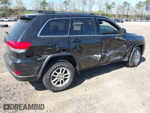 2019 Jeep Grand Cherokee Altitude with VIN 1C4RJFAG7KC834321, listed as a IAAI auction lot 42144206 with 97,015 mi miles and . Bid and sale history available at DreamBid. Image 4.