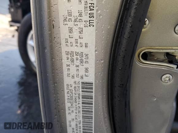 2016 Dodge Journey SXT with VIN 3C4PDCBG9GT224413, listed as a Copart auction lot 84042885 with 201,889 mi miles and Salvage title. Bid and sale history available at DreamBid. Image 14.