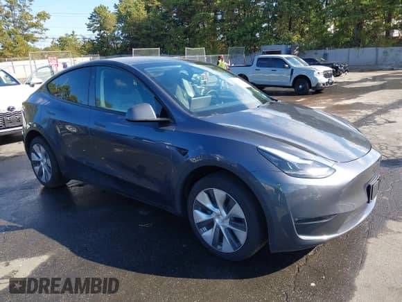 2023 Tesla Model Y Long Range with VIN 7SAYGDEE4PA192738, listed as a IAAI auction lot 43364402 with 14,872 mi miles and . Bid and sale history available at DreamBid. Image 1.