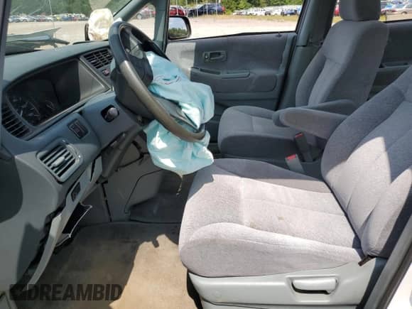 1996 Honda Odyssey z VIN JHMRA1840TC015701, wystawiony jako Copart lot #60103885 z przebiegiem 158 416 mil mil oraz Szkoda całkowita • Salvage title. Historia ofert i sprzedaży dostępna na DreamBid. Obrazek 7.