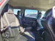 2016 Chevrolet Traverse LTZ z VIN 1GNKVJKD9GJ213704, wystawiony jako Copart lot #84606845 z przebiegiem 142 163 mil mil oraz Szkoda całkowita • Salvage title. Historia ofert i sprzedaży dostępna na DreamBid. Obrazek 11.