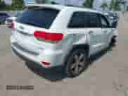 2014 Jeep Grand Cherokee Limited z VIN 1C4RJFBG8EC246639, wystawiony jako IAAI lot #42811330 z przebiegiem 129 719 mil mil oraz . Historia ofert i sprzedaży dostępna na DreamBid. Obrazek 4.