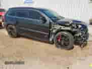 2012 Jeep Grand Cherokee SRT-8 z VIN 1C4RJFDJ2CC352056, wystawiony jako Copart lot #64309145 z przebiegiem 114 808 mil mil oraz Czysty tytuł • Clean title. Historia ofert i sprzedaży dostępna na DreamBid. Obrazek 4.