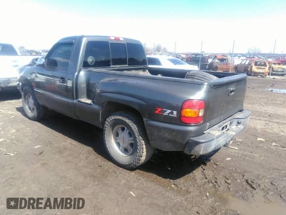 1999 GMC Sierra 1500 SLE with VIN 1GTEK14T8XZ516767, listed as a IAAI auction lot 32644736 with 163,695 mi miles and . Bid and sale history available at DreamBid. Image 3.