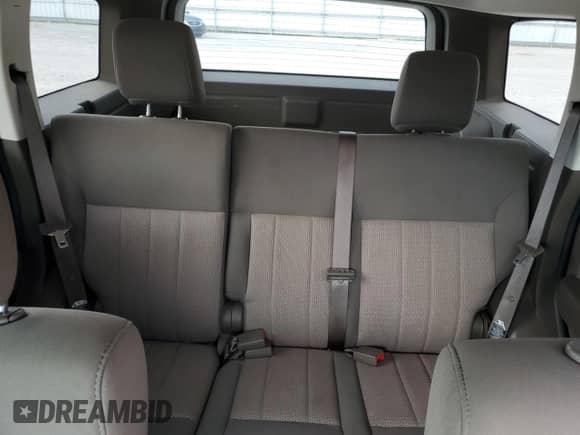 2010 Dodge Nitro Heat z VIN 1D4PT4GK3AW173808, wystawiony jako Copart lot #63020014 z przebiegiem 208 358 mil mil oraz Szkoda całkowita • Salvage title. Historia ofert i sprzedaży dostępna na DreamBid. Obrazek 10.