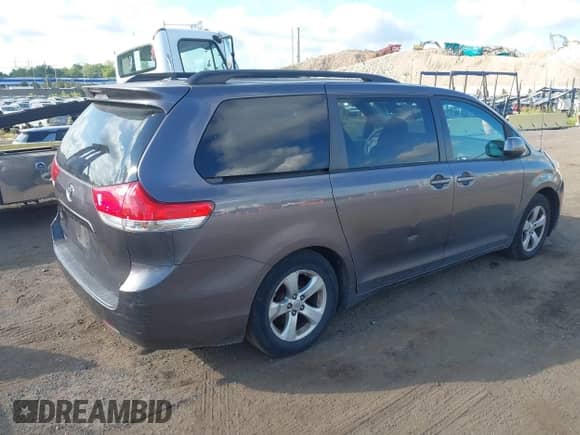 2012 Toyota Sienna LE AAS with VIN 5TDKK3DC2CS215910, listed as a IAAI auction lot 43063000 with 169,580 mi miles and . Bid and sale history available at DreamBid. Image 4.