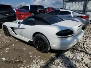 2004 Dodge Viper SRT-10 with VIN 1B3JZ65Z64V101042, listed as a Copart auction lot 73650684 with 27,753 mi miles and Salvage title. Bid and sale history available at DreamBid. Image 2.