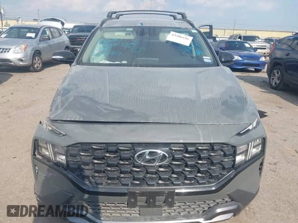 2023 Hyundai Santa Fe XRT with VIN 5NMS64AJ3PH506325, listed as a IAAI auction lot 43206180 with 63,680 mi miles and . Bid and sale history available at DreamBid. Image 12.