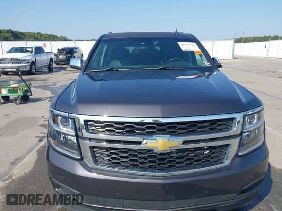 2016 Chevrolet Suburban LT with VIN 1GNSKHKC5GR391281, listed as a IAAI auction lot 43153704 with 199,019 mi miles and . Bid and sale history available at DreamBid. Image 6.