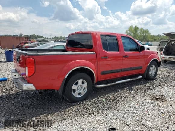 2008 Nissan Frontier SE with VIN 1N6AD07U58C414884, listed as a Copart auction lot 68659655 with 165,078 mi miles and Salvage title. Bid and sale history available at DreamBid. Image 3.