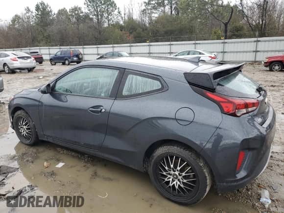 2019 Hyundai Veloster 2.0 z VIN KMHTG6AF3KU018000, wystawiony jako Copart lot #81749623 z przebiegiem 101 165 mil mil oraz . Historia ofert i sprzedaży dostępna na DreamBid. Obrazek 2.