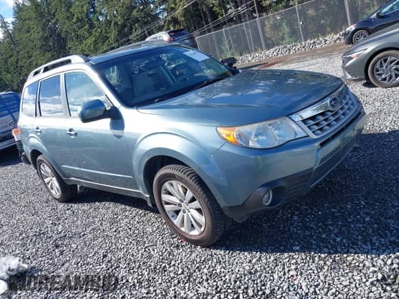 2012 Subaru Forester X Premium z VIN JF2SHADC2CH415856, wystawiony jako IAAI lot #43348750 z przebiegiem 131 478 mil mil oraz . Historia ofert i sprzedaży dostępna na DreamBid. Obrazek 1.