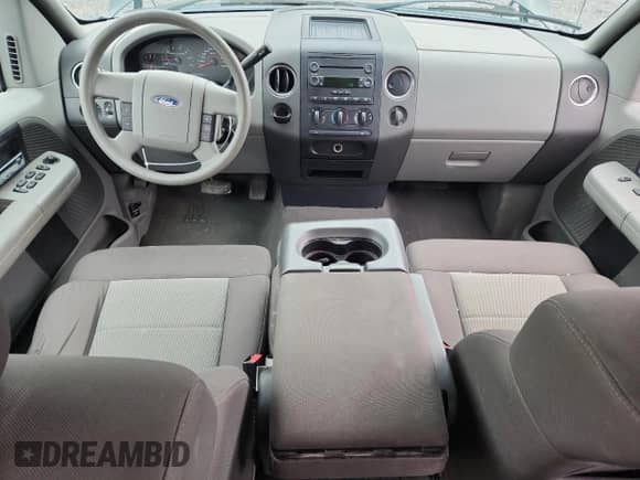 2006 Ford F-150 XL with VIN 1FTPX12V16NA82048, listed as a Copart auction lot 82268635 with 120,276 mi miles and Salvage title. Bid and sale history available at DreamBid. Image 8.