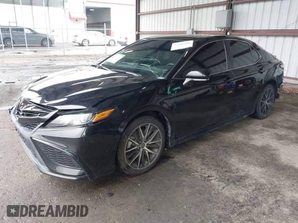 2022 Toyota Camry SE z VIN 4T1G11AK8NU710650, wystawiony jako IAAI lot #43416809 z przebiegiem 91 160 mil mil oraz . Historia ofert i sprzedaży dostępna na DreamBid. Obrazek 17.