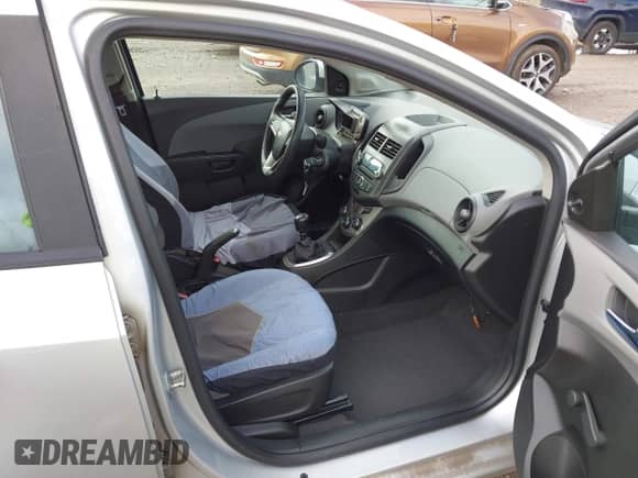 2012 Chevrolet Sonic LS with VIN 1G1JB6SH2C4114902, listed as a IAAI auction lot 42166155 with 140,977 mi miles and . Bid and sale history available at DreamBid. Image 5.