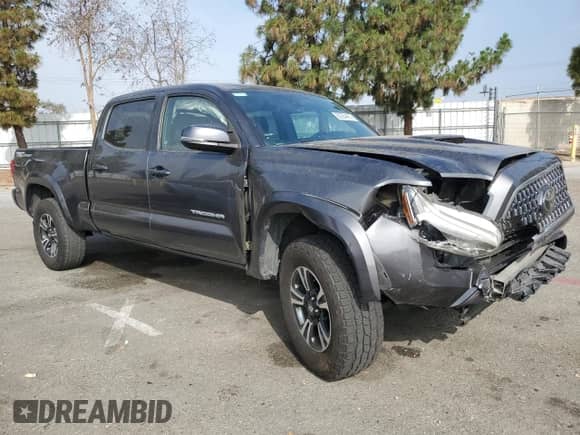 2018 Toyota Tacoma SR5 z VIN 3TMBZ5DN4JM017240, wystawiony jako Copart lot #60284405 z przebiegiem 150 310 mil mil oraz Szkoda całkowita • Salvage title. Historia ofert i sprzedaży dostępna na DreamBid. Obrazek 4.
