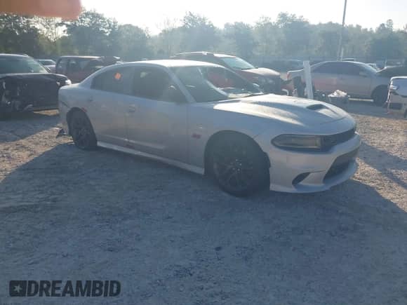 2023 Dodge Charger Scat Pack z VIN 2C3CDXGJ2PH651097, wystawiony jako IAAI lot #43270783 z przebiegiem 41 278 mil mil oraz . Historia ofert i sprzedaży dostępna na DreamBid. Obrazek 1.