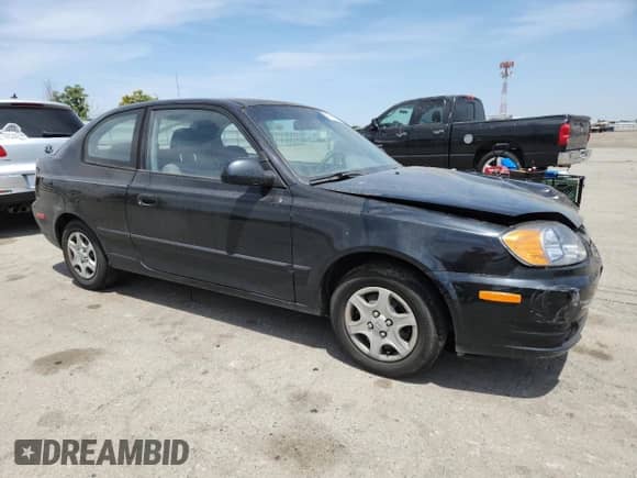 2003 Hyundai Accent GL с VIN KMHCG35C33U258812, выставлен на аукционе Copart как лот 57509245 с пробегом 153 716 миль миль и Списание • Salvage title. История ставок и продаж доступна на DreamBid. Изображение 4.