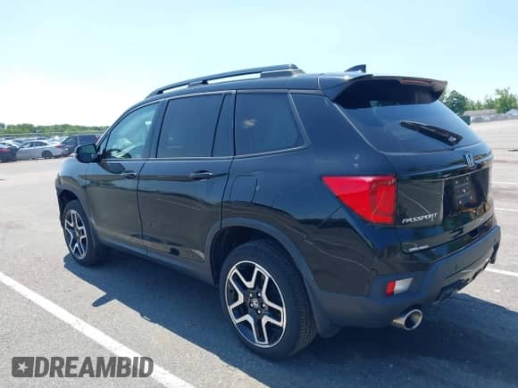2022 Honda Passport Elite with VIN 5FNYF8H00NB004126, listed as a IAAI auction lot 42401773 with 32,012 mi miles and . Bid and sale history available at DreamBid. Image 3.
