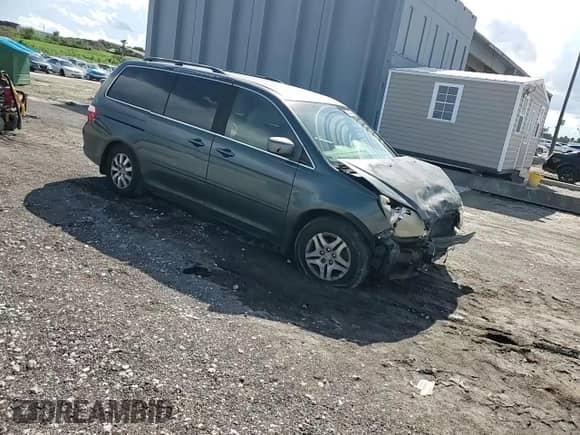 2005 Honda Odyssey EX с VIN 5FNRL38495B401224, выставлен на аукционе Copart как лот 80556355 с пробегом 258 303 миль миль и Списание • Salvage title. История ставок и продаж доступна на DreamBid. Изображение 15.