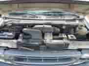 1999 Ford Econoline Cargo z VIN 1FTRE1429XHA29986, wystawiony jako Copart lot #70331004 z przebiegiem 312 901 mil mil oraz Nie do naprawy • Non repairable. Historia ofert i sprzedaży dostępna na DreamBid. Obrazek 12.