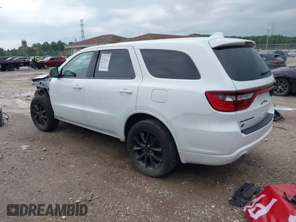 2018 Dodge Durango GT with VIN 1C4RDJDG7JC142435, listed as a IAAI auction lot 43121012 with 137,637 mi miles and . Bid and sale history available at DreamBid. Image 3.