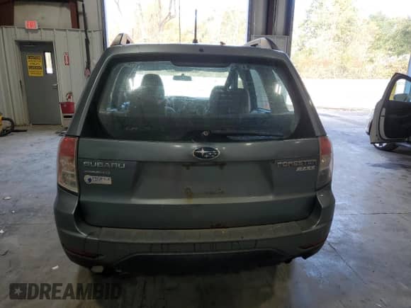 2012 Subaru Forester X z VIN JF2SHABC2CH409963, wystawiony jako Copart lot #90790275 z przebiegiem 173 208 mil mil oraz Czysty tytuł • Clean title. Historia ofert i sprzedaży dostępna na DreamBid. Obrazek 6.