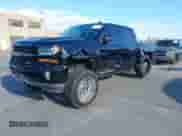 2018 Chevrolet Silverado 1500 LT with VIN 3GCUKRECXJG264567, listed as a IAAI auction lot 43422265 with 83,551 mi miles and . Bid and sale history available at DreamBid. Image 2.