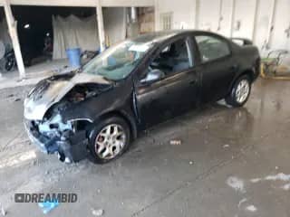 2002 Dodge Neon ES with VIN 1B3ES56C52D625182, listed as a Copart auction lot 69001705 with 234,323 mi miles and Salvage title. Bid and sale history available at DreamBid. Image 1.