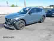 2022 Mazda CX-5 S Preferred z VIN JM3KFBCM2N1565165, wystawiony jako IAAI lot #42507203 z przebiegiem 39 853 mil mil oraz . Historia ofert i sprzedaży dostępna na DreamBid. Obrazek 2.