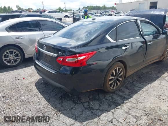 2016 Nissan Altima S with VIN 1N4AL3AP9GC229459, listed as a IAAI auction lot 42972723 with Not provided miles and . Bid and sale history available at DreamBid. Image 4.