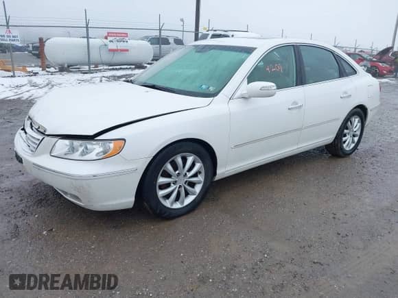 2007 Hyundai Azera SE z VIN KMHFC46F77A229425, wystawiony jako IAAI lot #41564209 z przebiegiem 173 671 mil mil oraz . Historia ofert i sprzedaży dostępna na DreamBid. Obrazek 2.