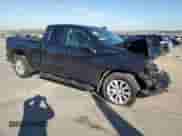 2023 Chevrolet Silverado 1500 Custom with VIN 1GCRABEKXPZ267498, listed as a Copart auction lot 85582474 with 32,599 mi miles and Salvage title. Bid and sale history available at DreamBid. Image 4.