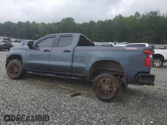 2019 Chevrolet Silverado 1500 Custom Trail Boss with VIN 1GCRYCEF5KZ300419, listed as a Copart auction lot 56122355 with 80,530 mi miles and Salvage title. Bid and sale history available at DreamBid. Image 2.