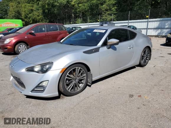 2013 Scion FR-S z VIN JF1ZNAA12D1718838, wystawiony jako Copart lot #85689585 z przebiegiem 93 762 mil mil oraz Czysty tytuł • Clean title. Historia ofert i sprzedaży dostępna na DreamBid. Obrazek 1.