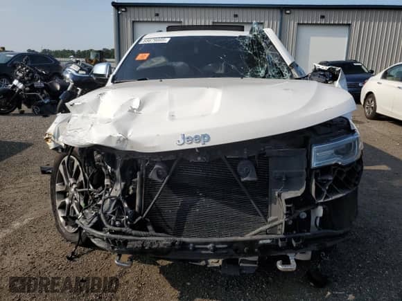 2018 Jeep Grand Cherokee Overland z VIN 1C4RJFCG2JC503559, wystawiony jako Copart lot #65679805 z przebiegiem Nie podano mil oraz Szkoda całkowita • Salvage title. Historia ofert i sprzedaży dostępna na DreamBid. Obrazek 5.